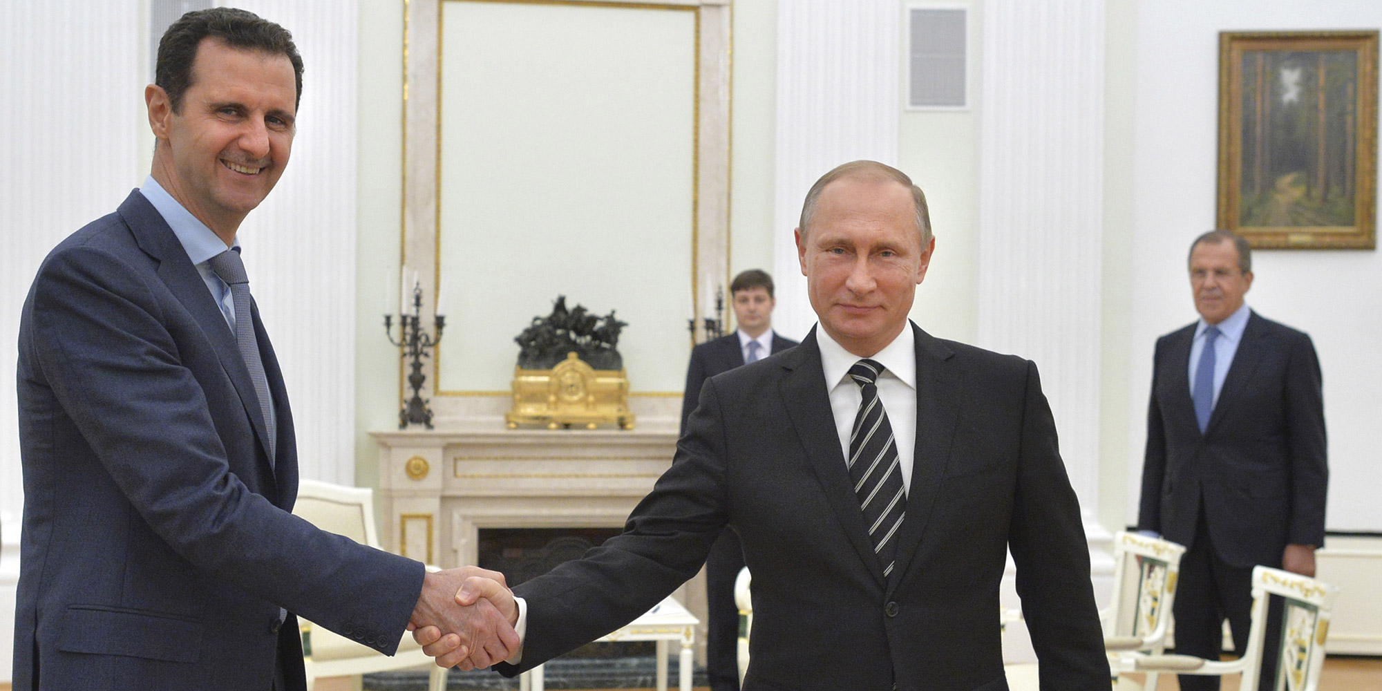 Dr. Rami Kalazi shaking hands with another man