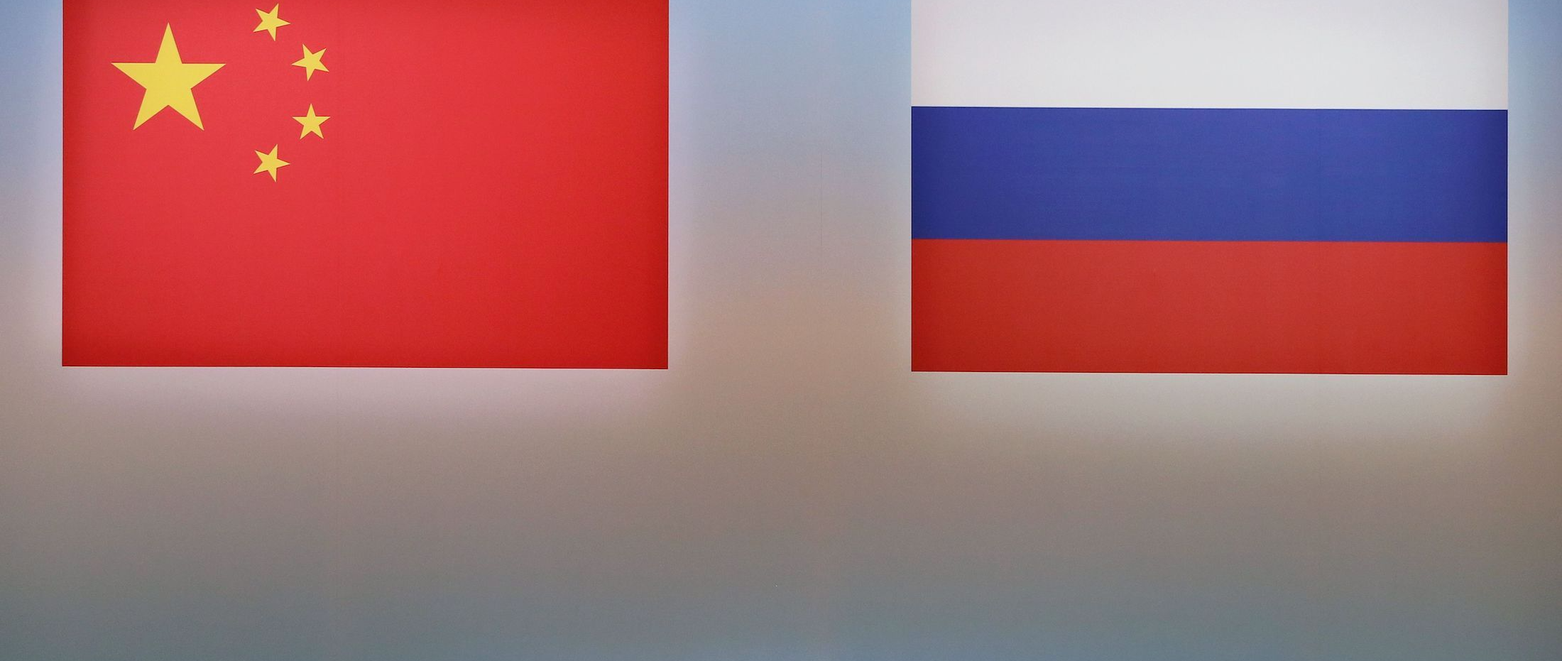 the two flags on the wall