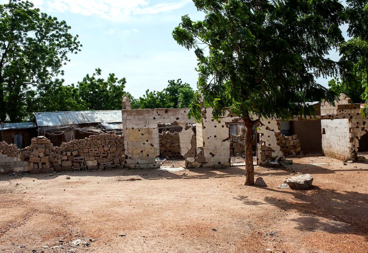 A building riddled with bullet holes in Pulka, Nigeria.