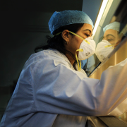 Dr. adding samples into vials