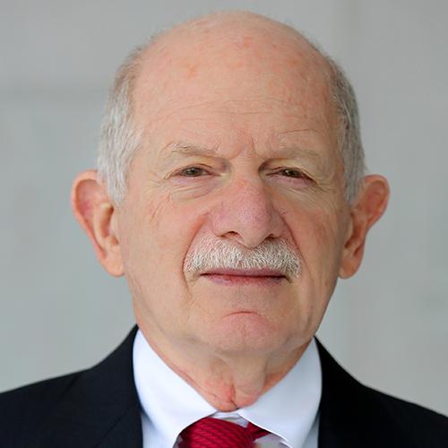 Mark L. Schneider
