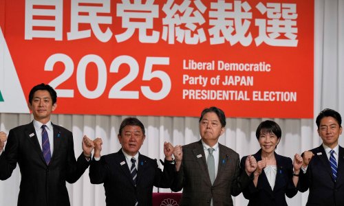 Photo: EUGENE HOSHIKO/POOL/AFP via Getty Images