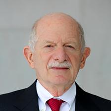 Mark L. Schneider