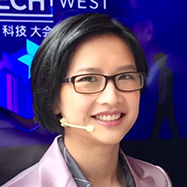 Asian woman with glasses and short brown hair