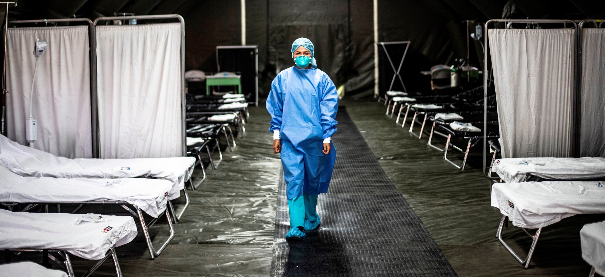 A specialist walks inside a mobile unit set up by the Peruvian Ministry of Health as a preventive measure if a case of the COVID-19 virus.