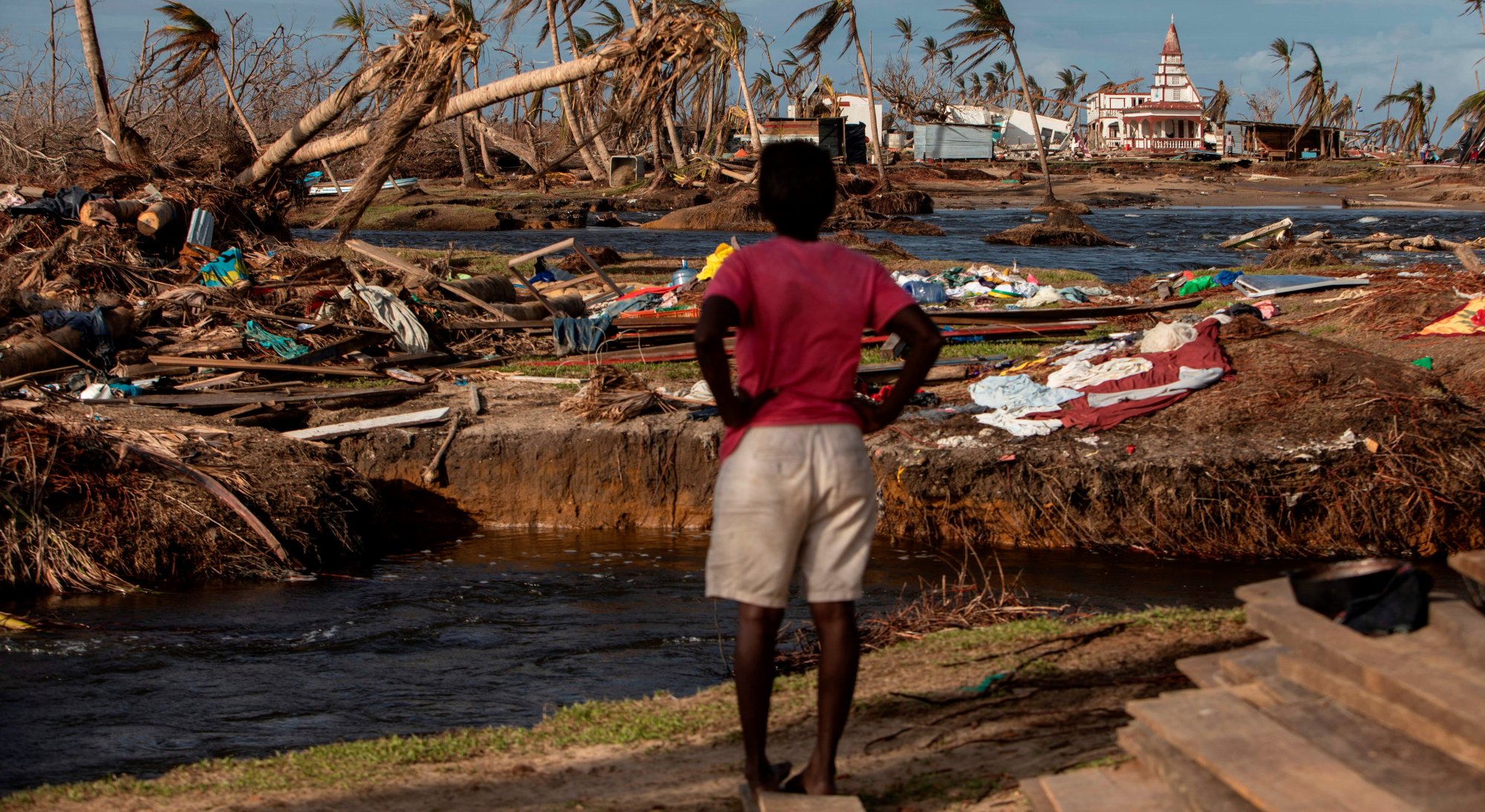 A woman looks at the destruction in Haulover, a community 41 km south of Bilwi, in the Northern Caribbean Autonomous Region, Nicaragua, on November 28, 2020, days after the passage of Hurricane Iota. 