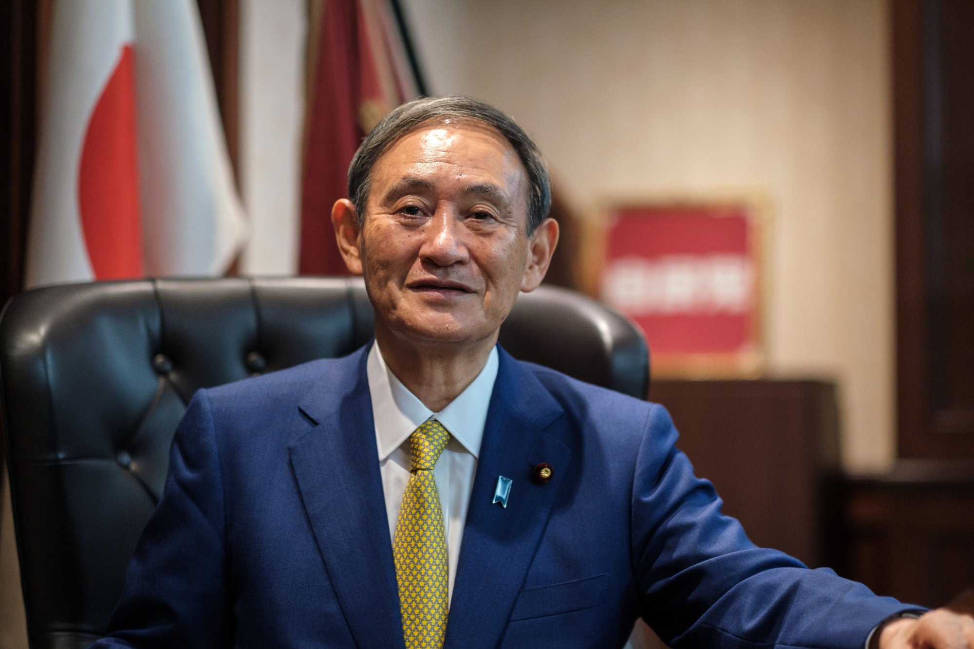 Yoshihide Suga poses for a portrait at his office following his press conference at the Liberal Democratic Party’s headquarters in Tokyo on September 14, 2020. (Photo by NICOLAS DATICHE/POOL/AFP via Getty Images.)